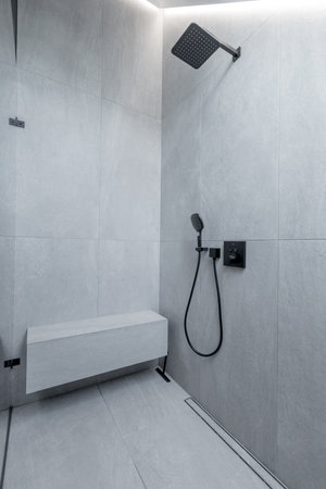 Beautiful Elegant Modern Luxury Bathroom Interior in Luxury Home and Glass Door Showerの写真素材