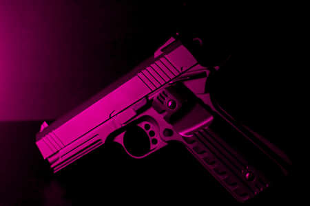 Pistol with purple lightsの写真素材