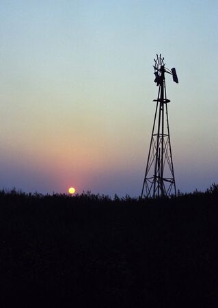 Old Windmill with beautiful sunsetの写真素材