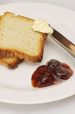Breakfast with juice bread on white background close up