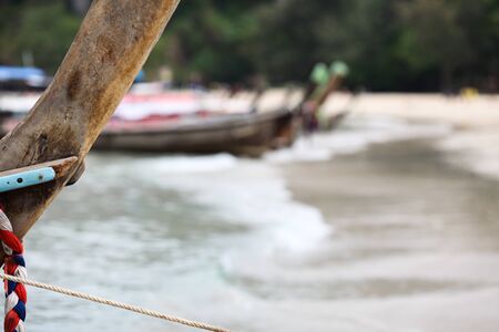 Fishing boats are at the beach. Blurred background.の写真素材