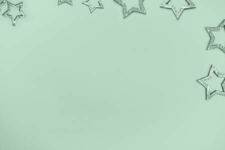 Star with sparkles on green background.Top view. Festive concept.の写真素材