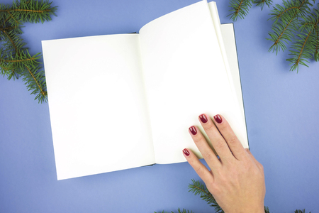 Note book is open on paper background with copy space.の写真素材