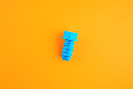 Blue bolts on orange background. Children's toys.
