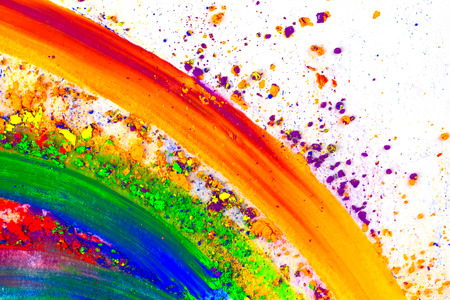 Natural colored pigment powder smeared on a sheet of white paper.の写真素材