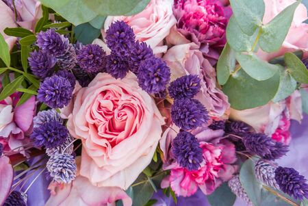 Gorgeous bouquet of roses and carnations with decorative dried flowers.の写真素材
