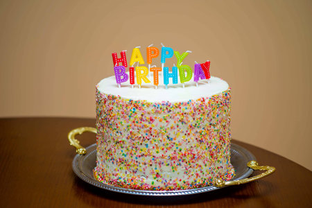 sweet birthday cake with candles