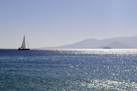 sailboat into the seaの写真素材