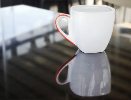 cup of cappuccino reflectionの写真素材