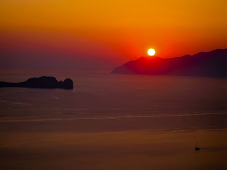 red sunset milos islandの写真素材