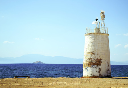lighthouse in Aegina island Greeceの写真素材
