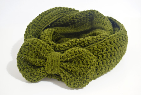 crochet green infinity scarf with big bowの写真素材