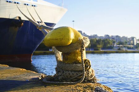 ship tied to the mooring at the port of Piraeus Greece
