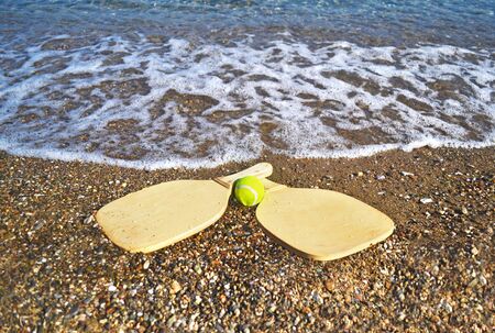 rackets on the beach - summer sports - summer photoの写真素材