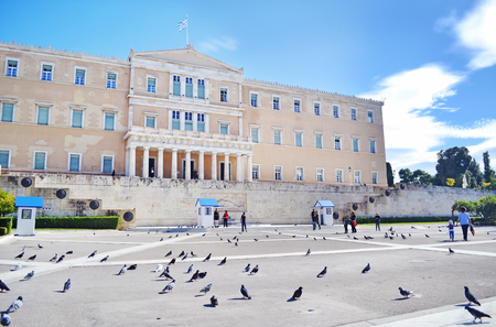 ATHENS GREECE, JANUARY 12 2016: the greek parliament with the greek Evzones soldiers, guarding the tomb of the unknown soldier at Syntagma Athens Greece. Editorial use.のeditorial素材