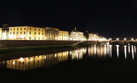 night landscape of the Arno river of Florence or Firenze city Italyのeditorial素材