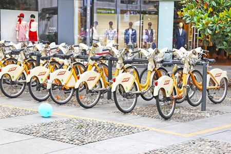MILAN ITALY, MAY 31 2018: yellow bicycles at Milan city Italy. Editorial use.のeditorial素材