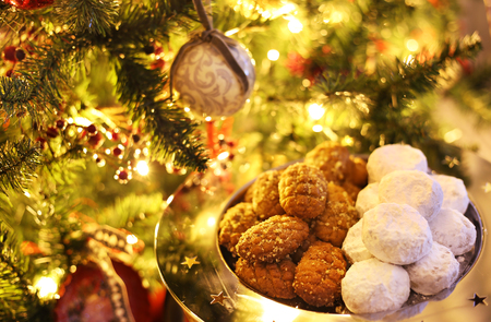 greek melomakarona and kourabies - traditional Christmas cookies with honey and nuts and sugar bunsの写真素材