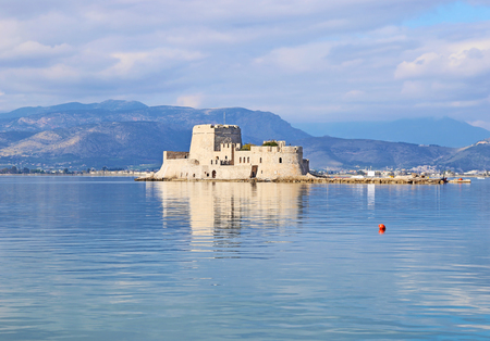 landscape of the water castle of Bourtzi - a Venetian castle in the middle of the harbour of Nafplio Argolis Greeceのeditorial素材