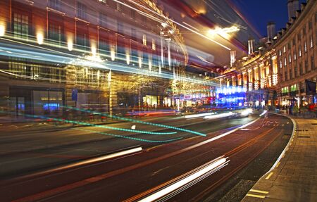 LONDON UNITED KINDOM, OCTOBER 25 2018: night scene of London city - long exposure photography with moving bus and cars. Editorial use.のeditorial素材