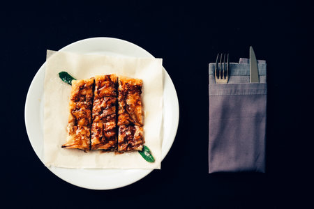 fresh rolled stuffed crepes on plate