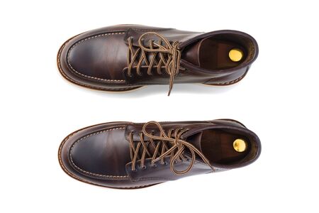 men brown work boots isolated on whiteの写真素材