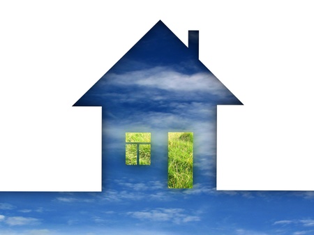Eco house metaphor. House with grass and sky.の写真素材
