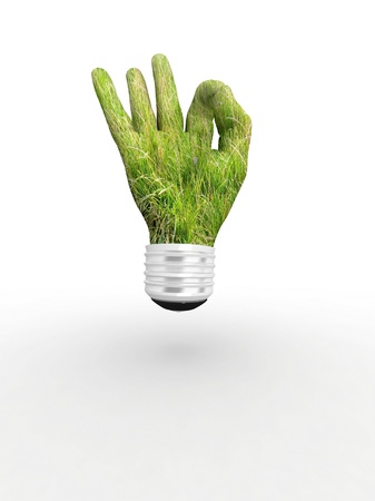 3D lightbulb - hand OK with grass. Concept - eco energy.の写真素材