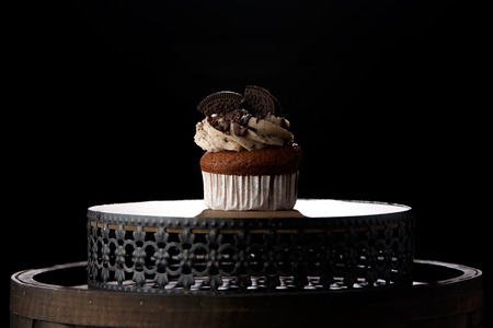 Delicious cupcake on dark background. selective focusの写真素材
