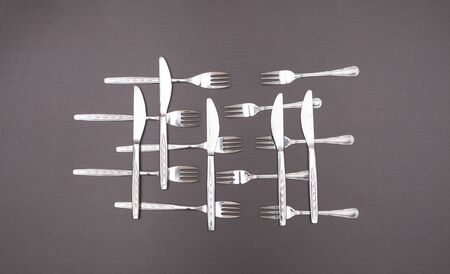 Cutlery set on black table. Concept of cooking and restaurant