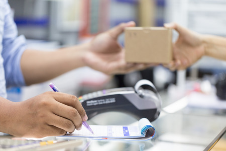 business concept of payment dealing by card swipe machine in business trader 