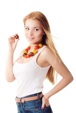 girl with necklace of tomato on the neckの写真素材