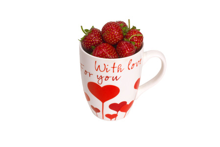 Sweet Strawberry in a cup with a creamの写真素材