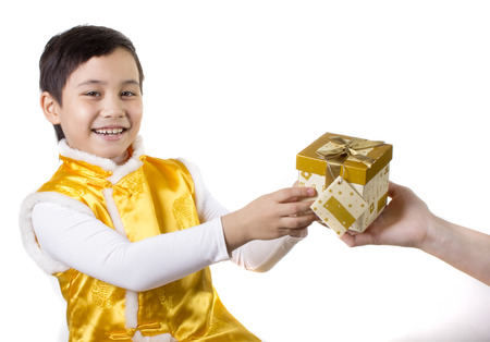 boy takes golden boxの写真素材