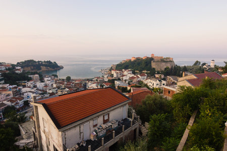Sunrise landscape of small old town Ulcinj in Montenegro at adriatic seaの写真素材