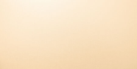 background of yellow metallized paper textureの写真素材