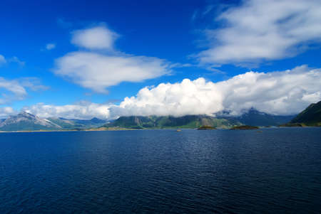 View of the bay Fjords with blue sky and mountains, Norwayの写真素材