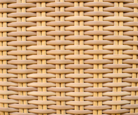Wicker furniture light brown textured backgroundの写真素材