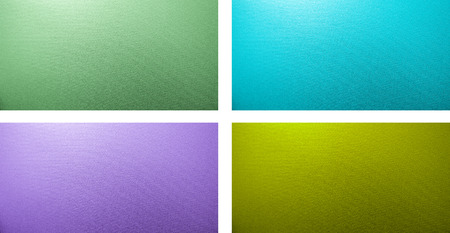 set of four textured  backgrounds: blue, purple, green, yellow-greenの写真素材