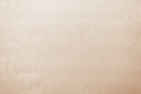 Background of skin color metallized paper textureの写真素材
