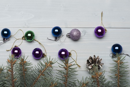 Set of christmas or new year decoration. with colorful balls and new year tree on vintage wooden backgroundの写真素材