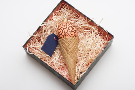 Colorful Christmas or New Year decoration with christmas box, ice cream cone, orange red christmas...