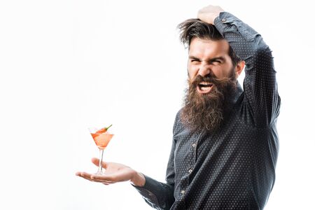 handsome bearded hipster with stylish hair mustache and long beard holding glass of alcoholic...