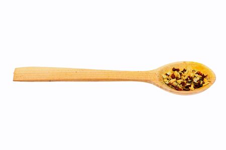 universal spicy fragrant cinnamon in wooden spoon isolated on white background, side viewの写真素材