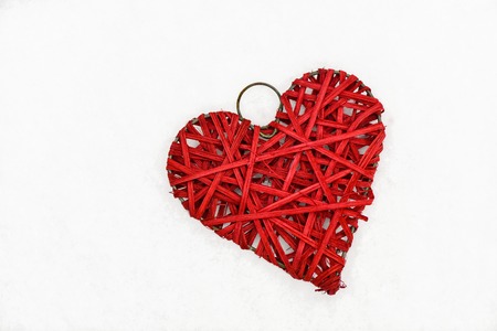 red handmade valentine heart isolated on white background, top viewの写真素材