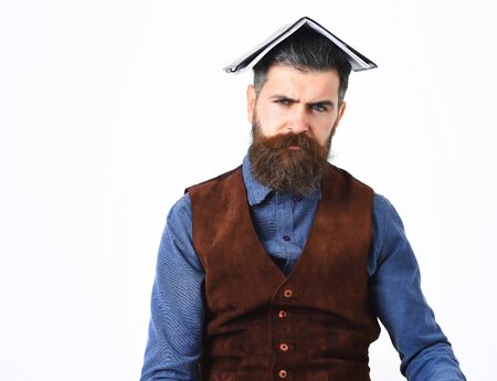 bearded man, long beard, brutal caucasian hipster with moustache holding notepad with serious face isolated on white backgroundの写真素材