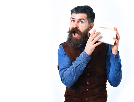 bearded man, long beard, brutal caucasian hipster with moustache holding lunch box with happy face isolated on white backgroundの写真素材