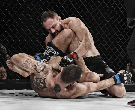 Kyiv, Ukraine -March 13, 2017: mma fighters fight at the ring fight at the championship in Palace of sport in Kiev, Ukraineのeditorial素材