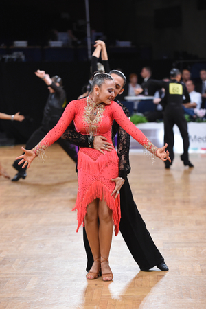 Stuttgart, Germany - August 14, 2015: An unidentified dance latin couple in a dance pose during Grand Slam Latin at German Open Championship, on August 14, in Stuttgart, Germanyのeditorial素材
