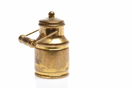 Milk can. Antique golden milk can isolated on white background, copy spaceの写真素材